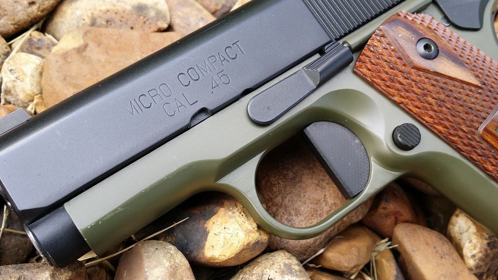 Flat trigger. Black 1911 Firearm Addicts